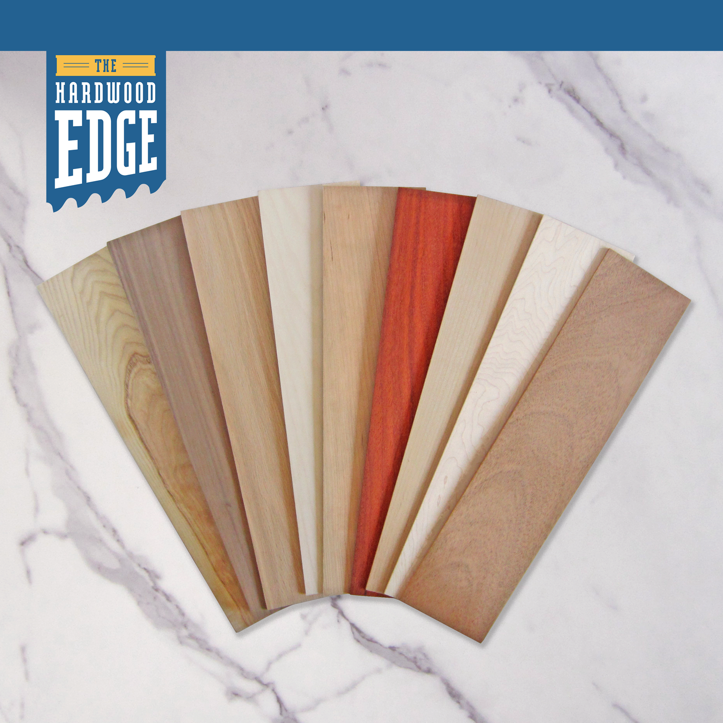 Hardwood sample swatches on a marble surface with 'The Hardwood Edge' logo.